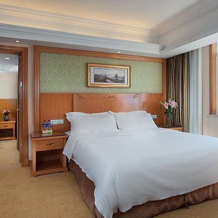 Vienna International Hotel Lijiang Yuxue Avenue Екстериор снимка